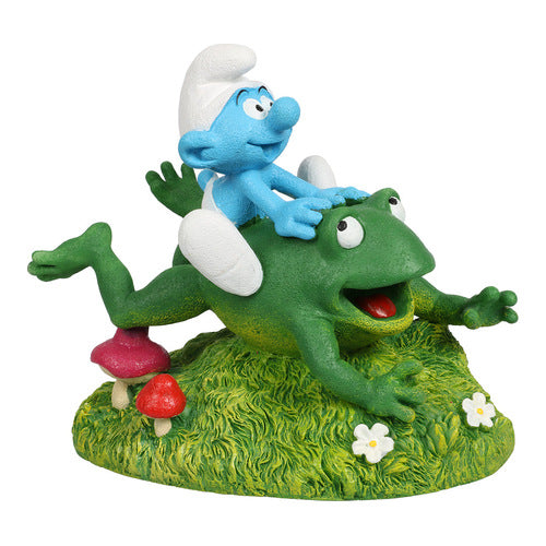 schlumpf auf frosch figur